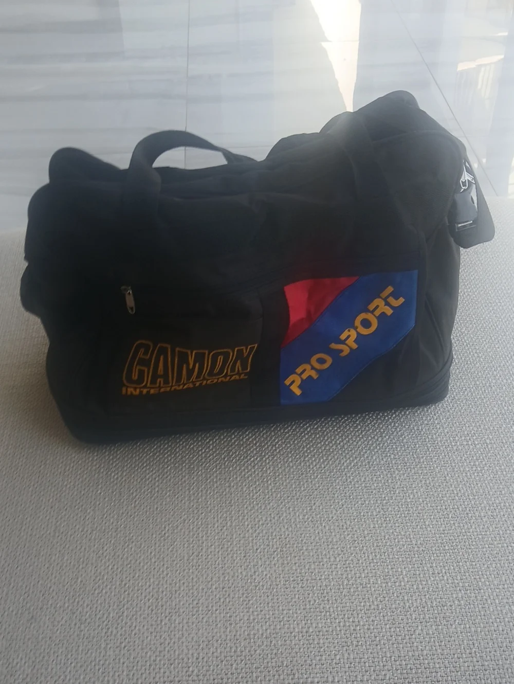 Camo Black Duffel with Red and Blue Accents